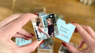 person holding acrylic block