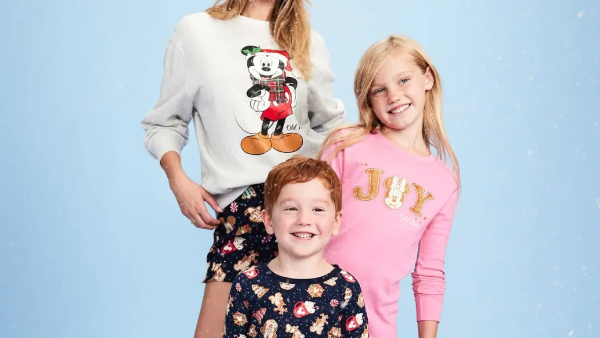 family wearing holiday themed pajamas