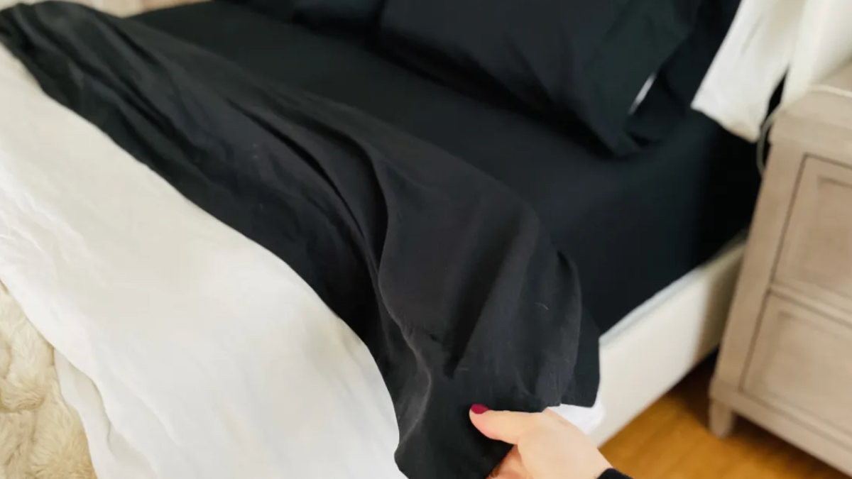 Linens & Hutch 6-Pc Sheet Set in the color black on a bed