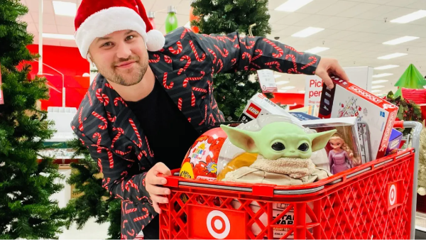 stetson in a target store with a cart full of toys