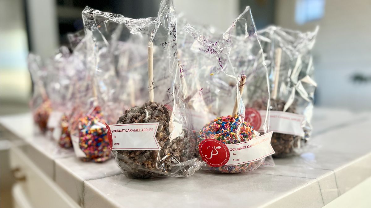 Gourmet candy apples on countertop