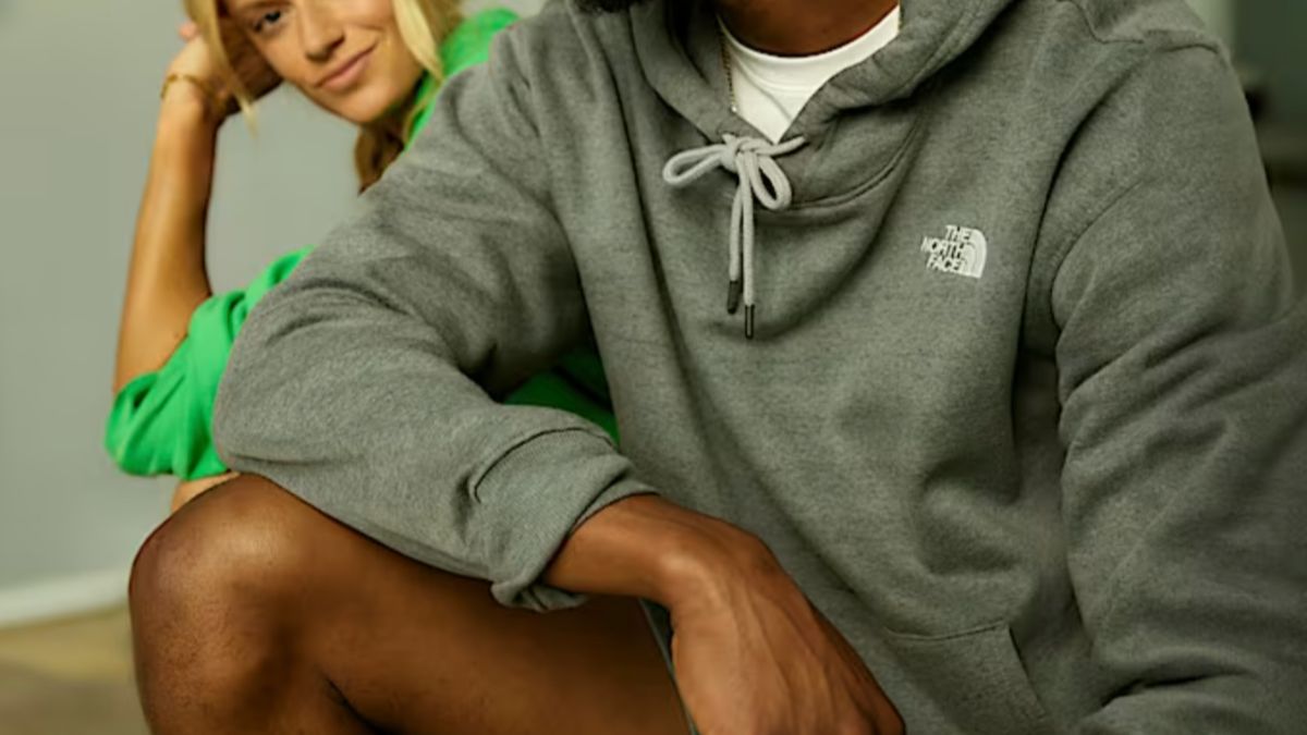 Man wearing gray Northface hoodie