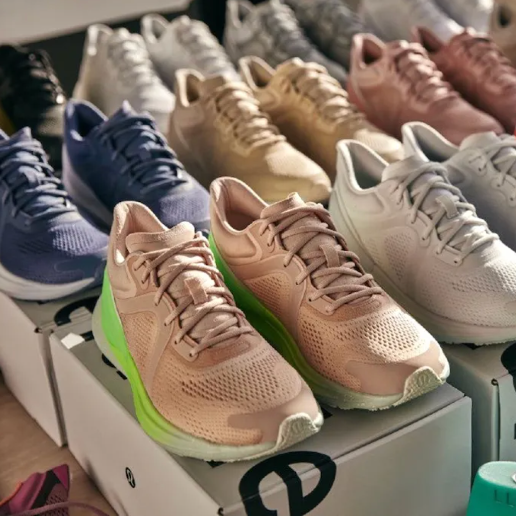 a bunch of different types of shoes on display