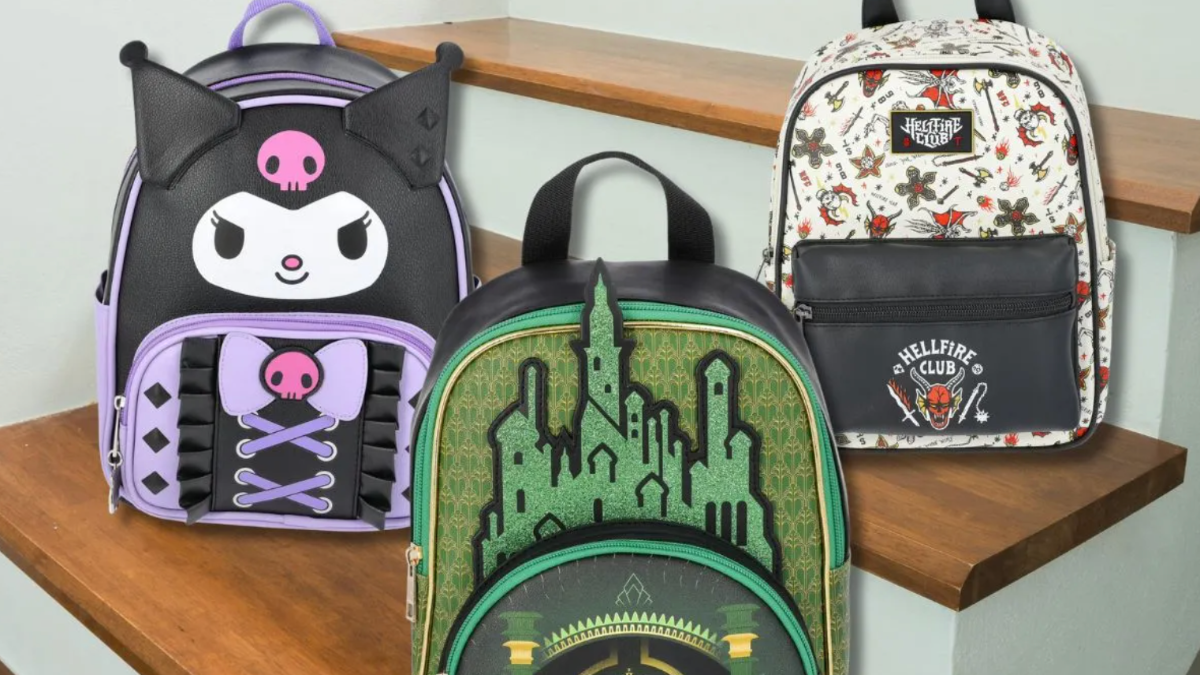 a row of backpacks on a wooden shelf