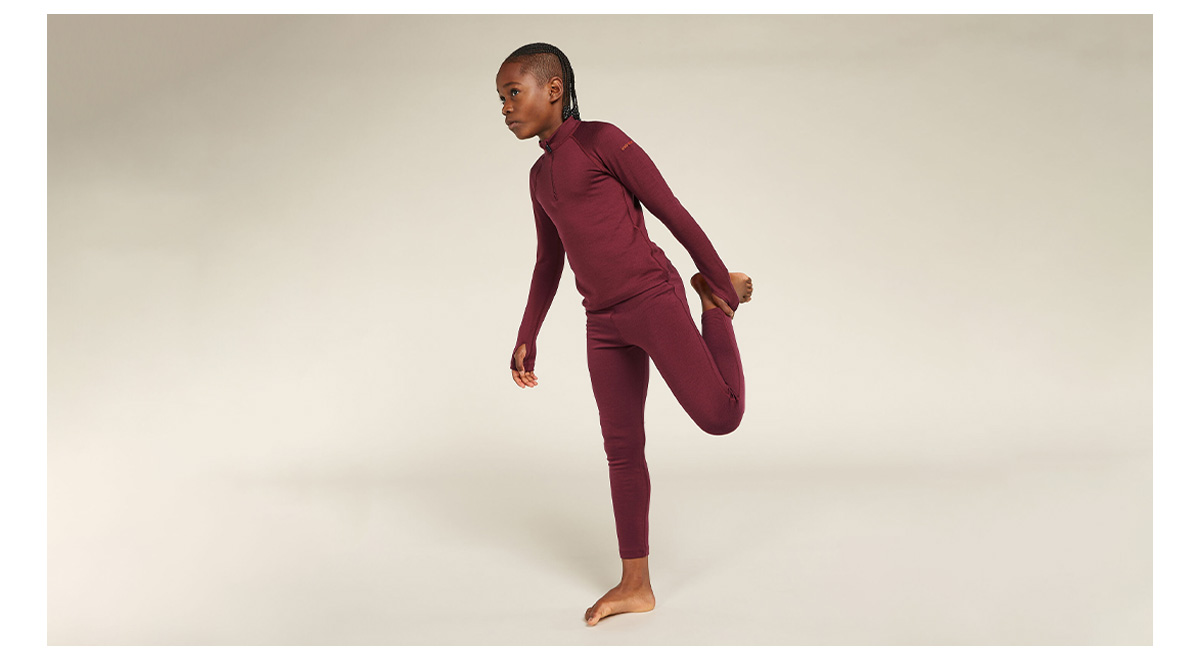 Boy in marron colored base layer set