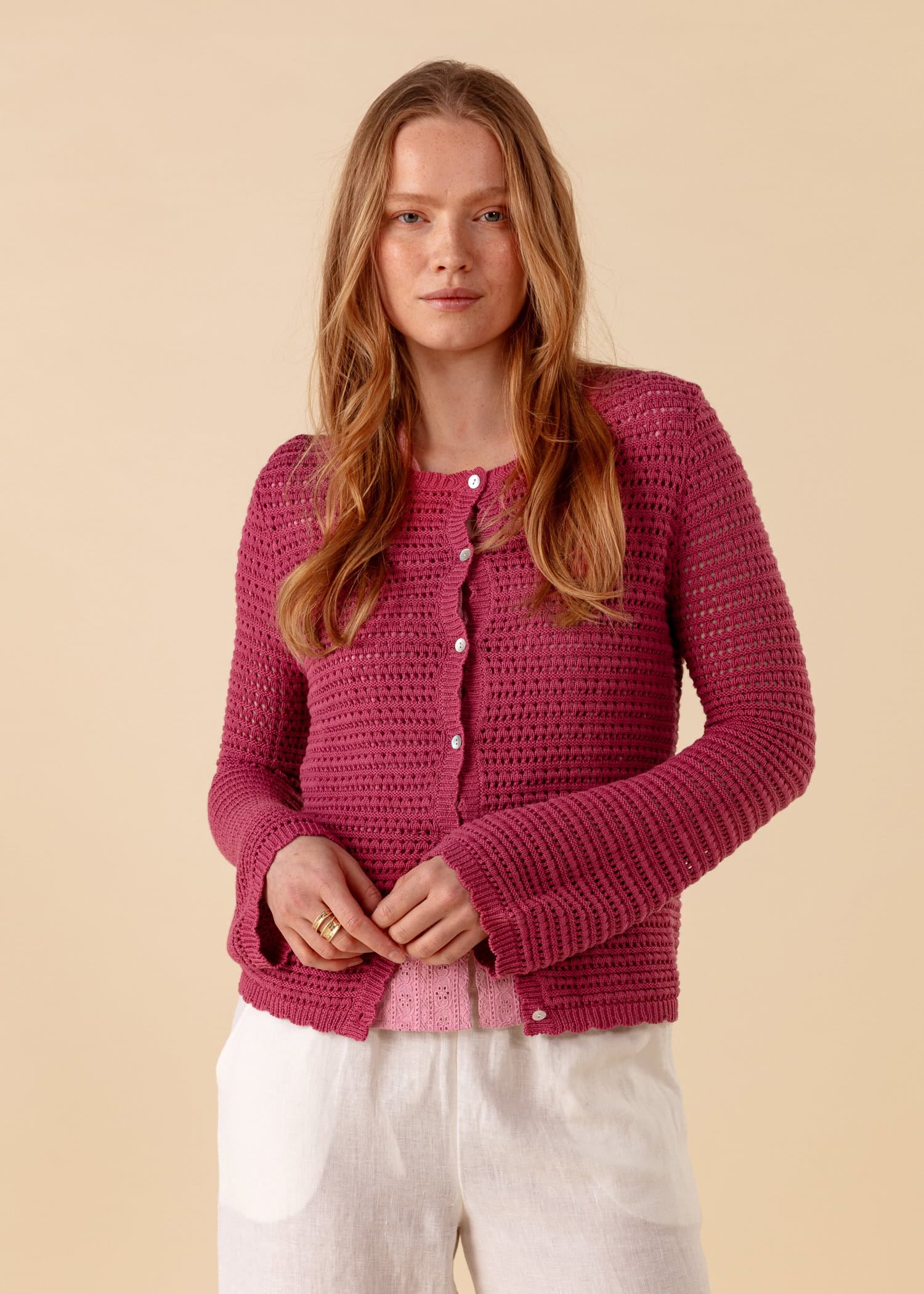 H&aring;lstickad cardigan