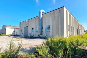 Complesso produttivo con uffici e pertinenze