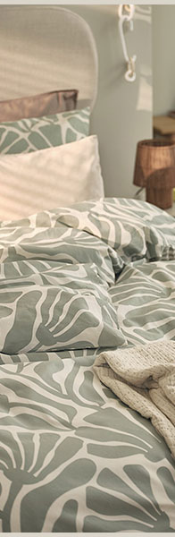 Zöld mintás ágyneműhuzat bézs pléddel