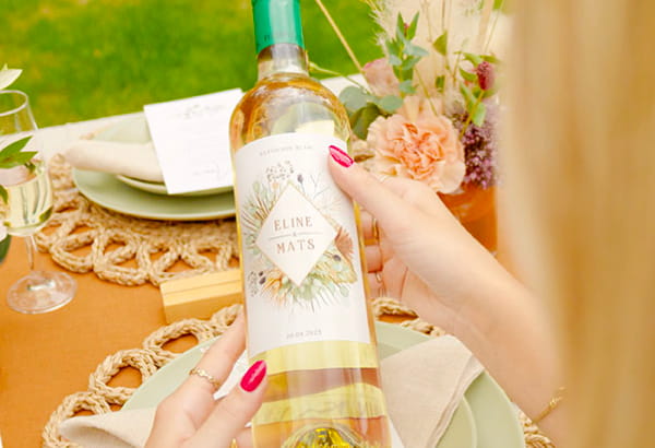 Wijnfles met gepersonaliseerd etiket