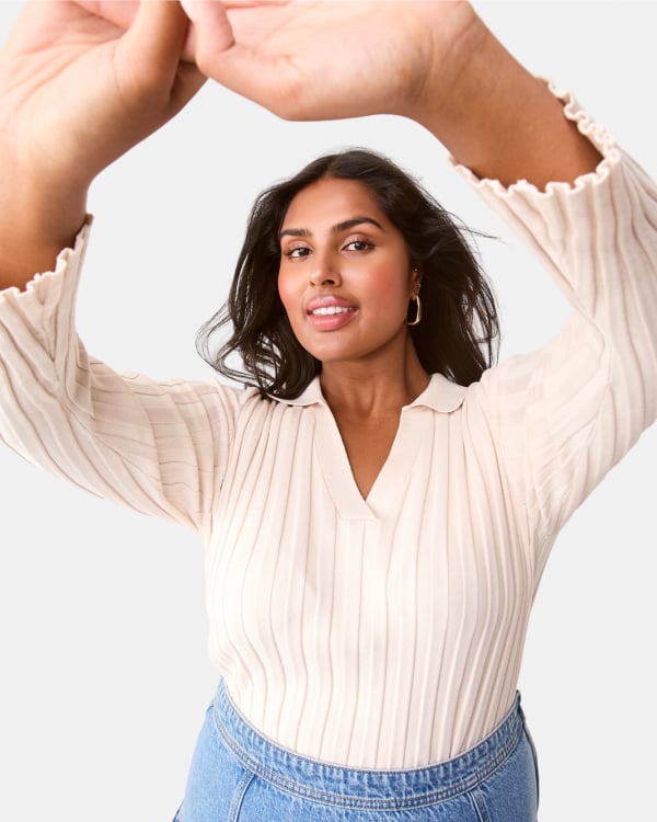 Knit polo top. Sizes: 6-20. $20. 