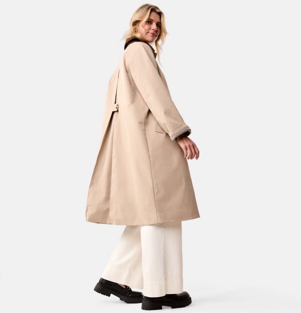 Contrast check-lined coat. Sizes: 6-20. $47. 