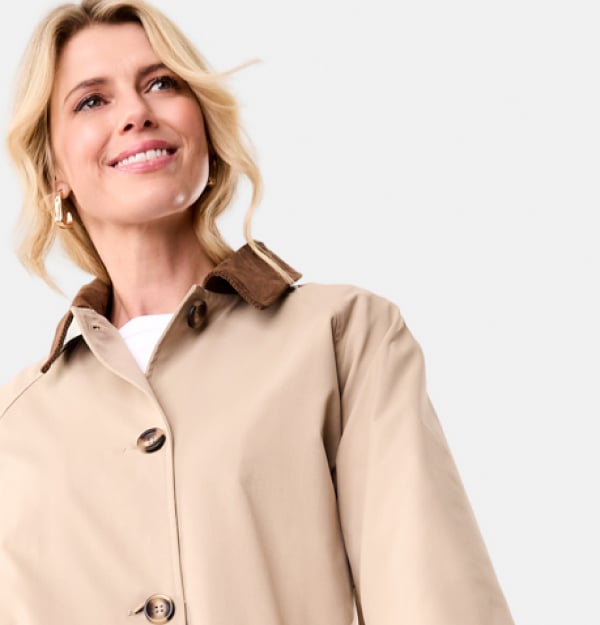 Contrast check-lined coat. Sizes: 6-20. $47. 