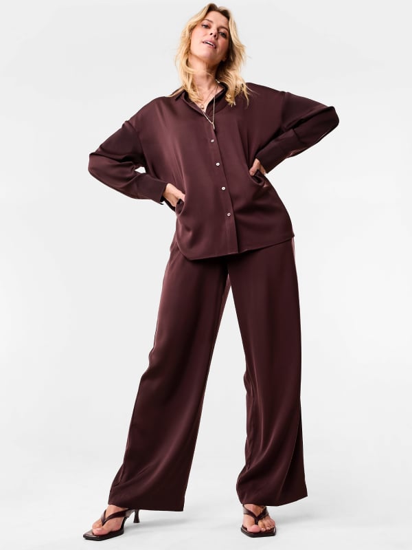 Oversized satin shirt. Sizes: 6-20. $29. Satin pant. Sizes 6-20. $24. Slingback kitten heel. Sizes: 5-11. $25pr.