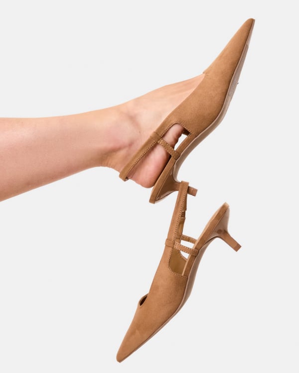 Slingback kitten heel. Sizes: 5-11. $25pr. Suedette pencil midi skirt. Sizes: 6-20. $29.