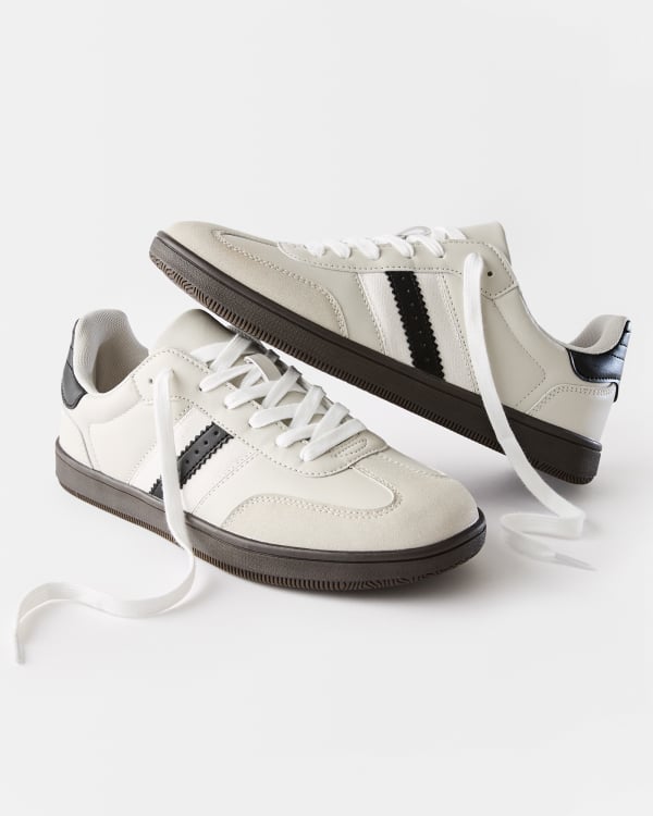 Lace up sneaker. Sizes: 7-13. $27pr.