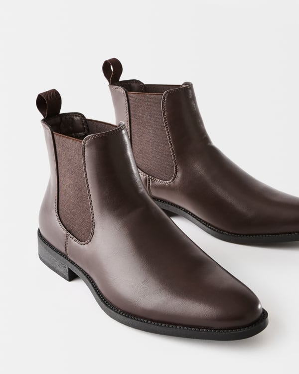 Textured crew knit. Sizes: XS-4XL. $22. PU Boot. Sizes: 7- 13. $40pr.