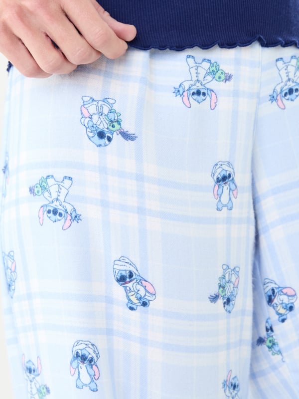 Womens Stitch ribtop and flannel pant PJs. Sizes: 6-22. $32 set.