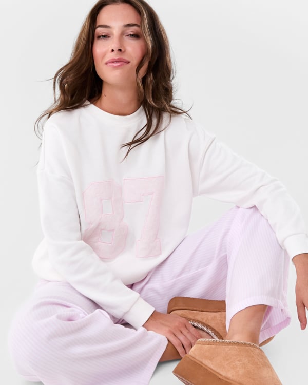 Sweat top and flannel pant PJ. Sizes: 6-22. $27.