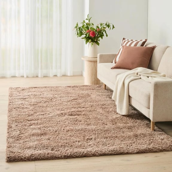 Flecked mocha rug. Size: 235cm x 160cm. $99.