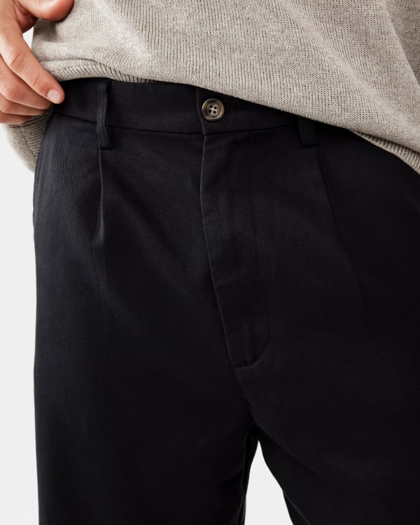 Pleated pant. Sizes: 28-44. $30.