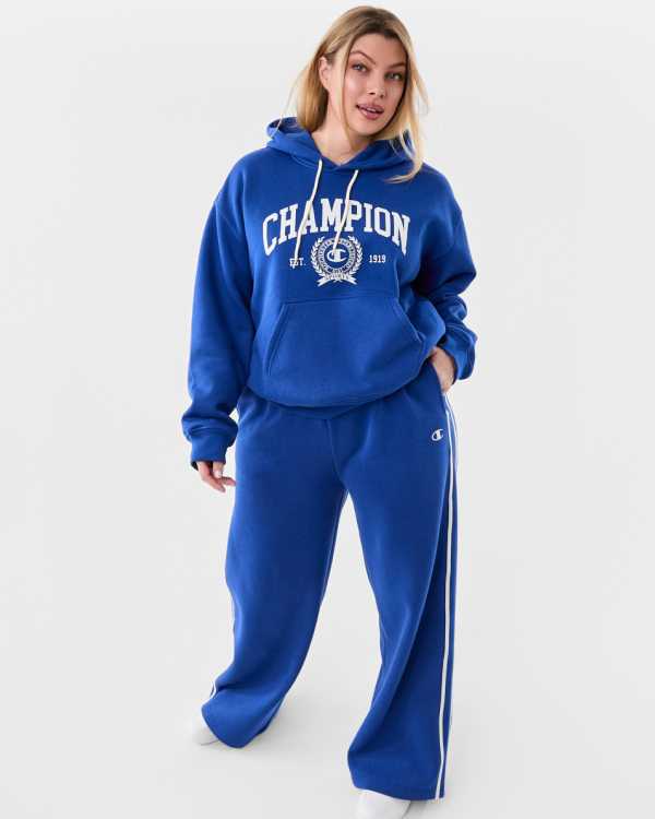 Champion stripe wide leg trackpant. Sizes: XXS–XXL. $55.