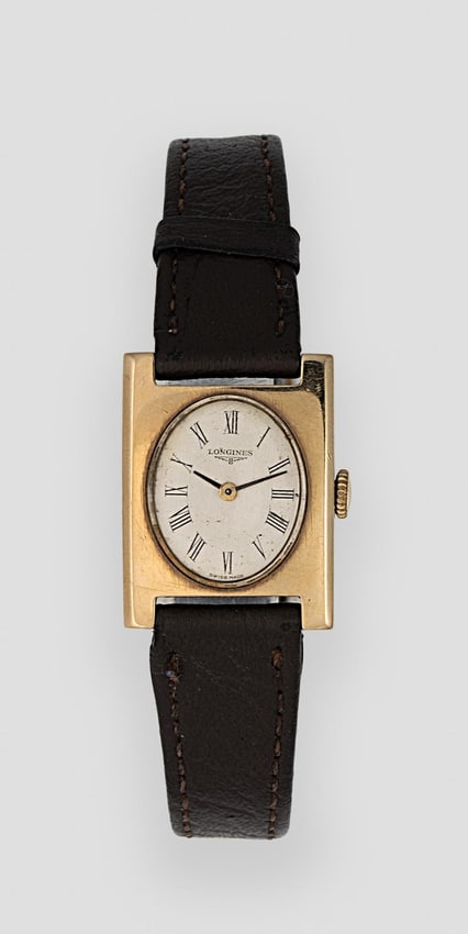 Longines - A 9ct gold wristwatch,