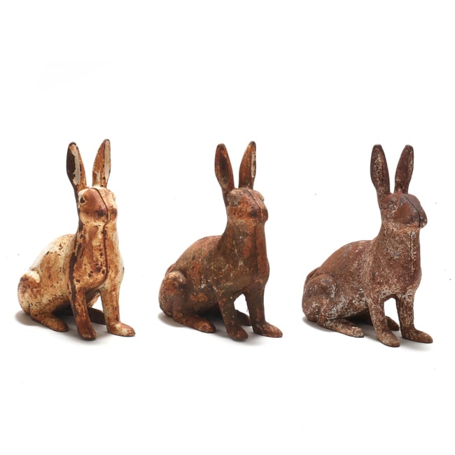 Three Cast Iron Garden Rabbits