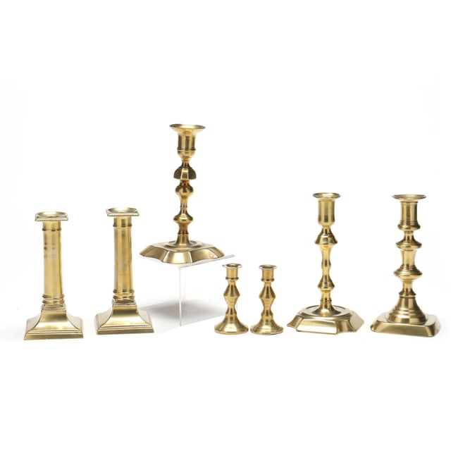 Seven Antique English Brass Candlesticks