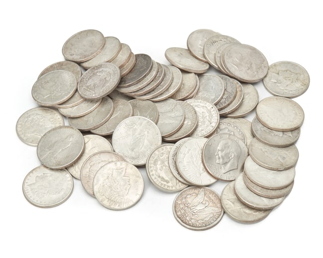 A group of United States silver dollar coins