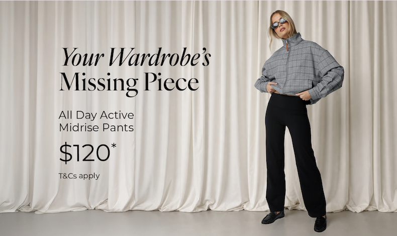 Woman wearing black  pants, standing in front of cream curtains. All Day Active Midrise Pants, $120*
