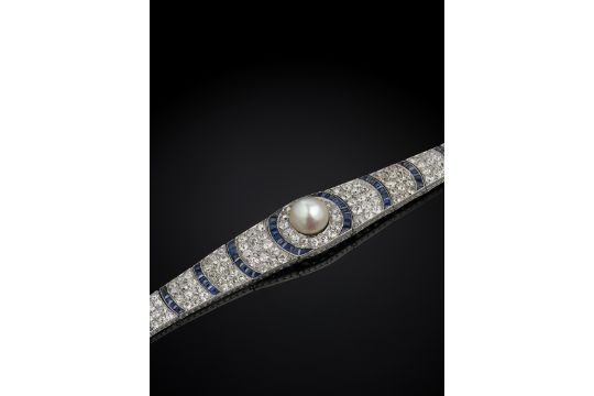 An Art Deco natural pearl, sapphire and diamond…