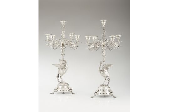 A pair of five-light silver candelabra