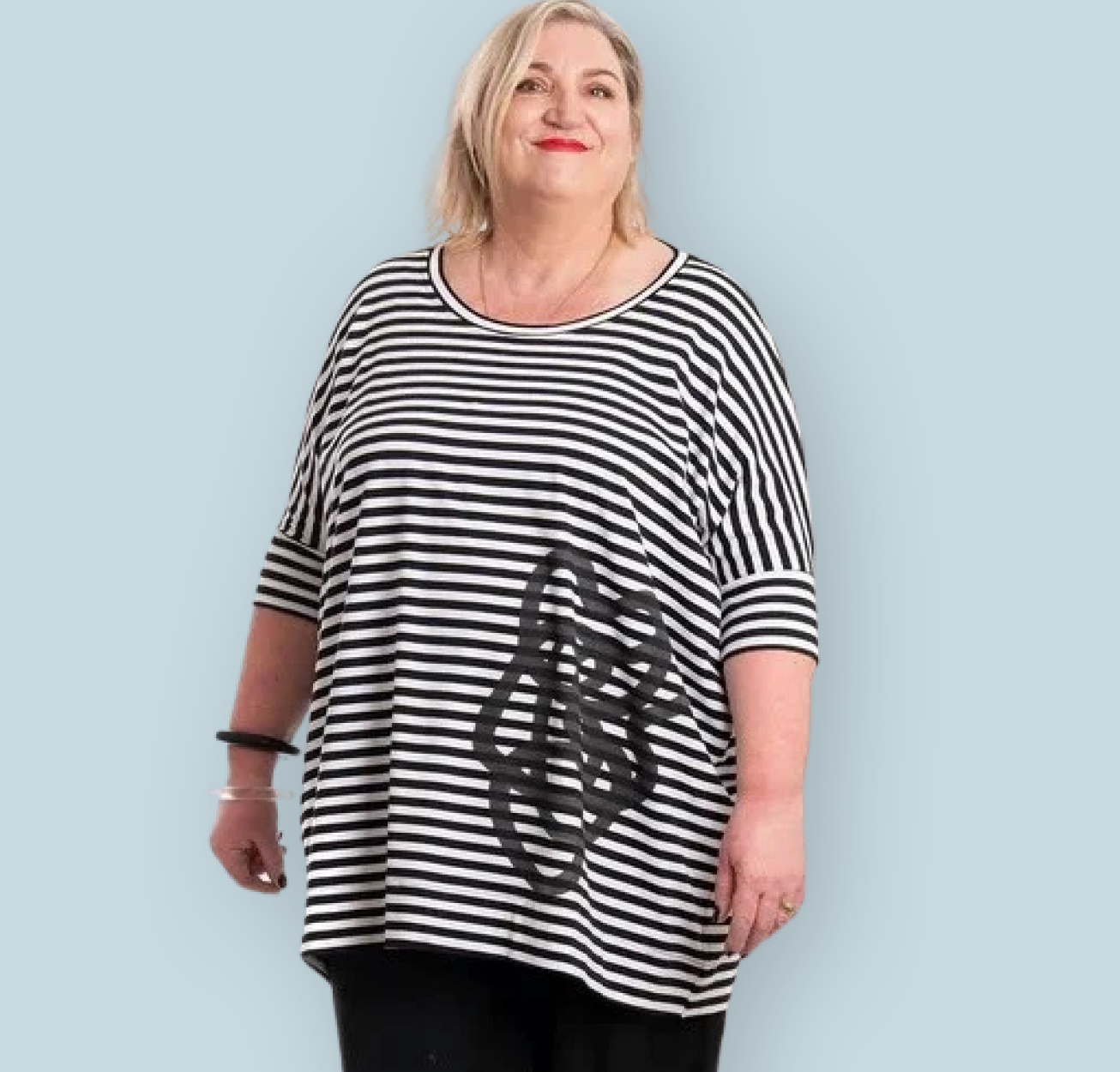 Square Top  Raven’s Square Tee is a future wardrobe staple! Its square shape offers flattering drape and coverage for all sizes, finished with a playful squiggle screen print.