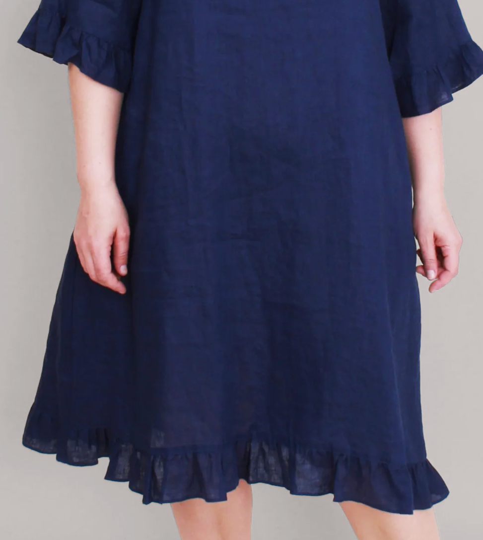 Magazine  Ruffle Dress  Avocado or Navy  Sizes to  fit 10-26    WAS $289  TODAY $99  SAVE $190