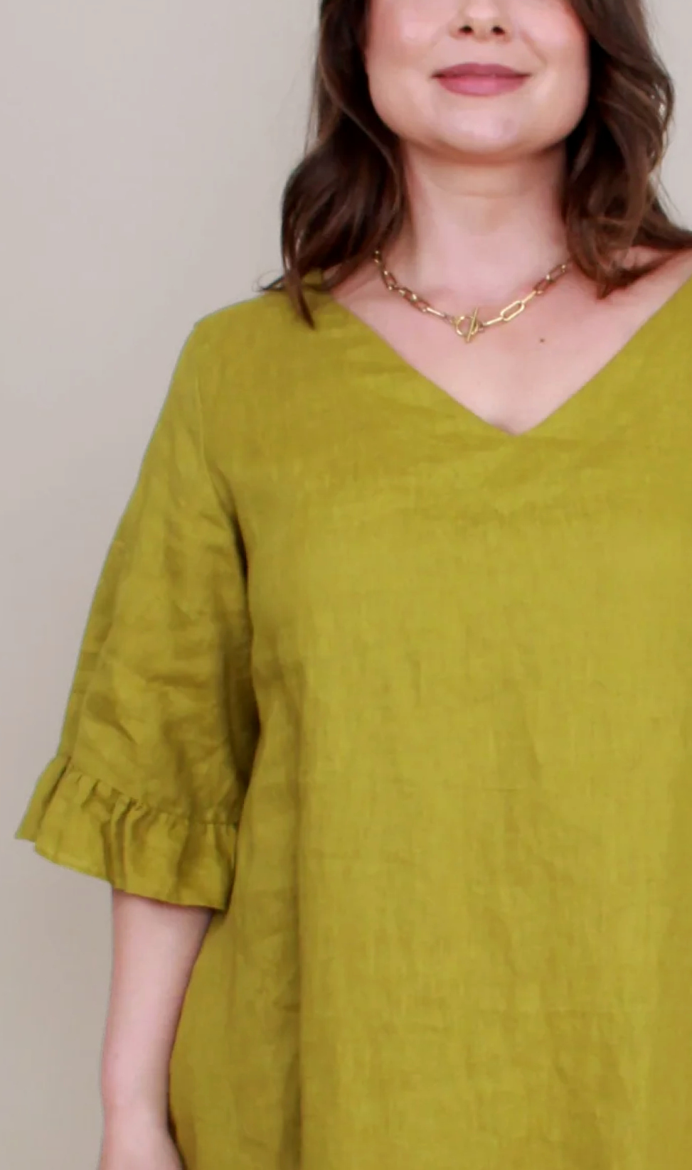 Magazine  Ruffle Dress  Avocado or Navy  Sizes to  fit 10-26    WAS $289  TODAY $99  SAVE $190