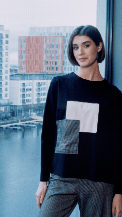 Applique Top  Refresh your wardrobe with this effortlessly stylish Peruzzi top, blending casual comfort with thoughtful design. Sizes 10-18.