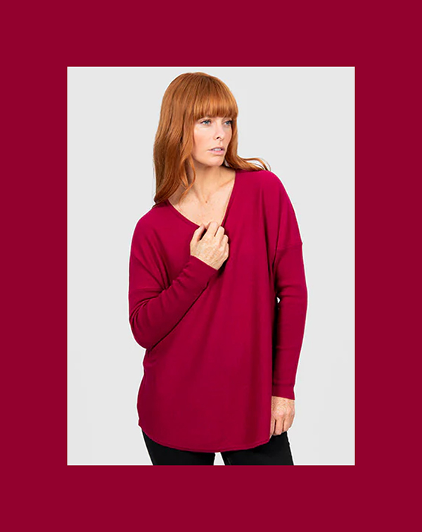 BEST SELLER! Queen Vee Curved Hem Pullover  Cassis, also in Ink and Aquamarine   95% Merino Woo/ 5% Cashmere   Sizes to fit 10-18