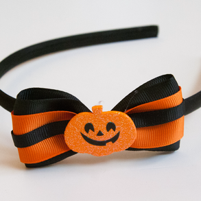 Fekete-narancssárga masnis hajpánt hajráf