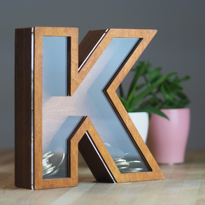 Betű alakú persely