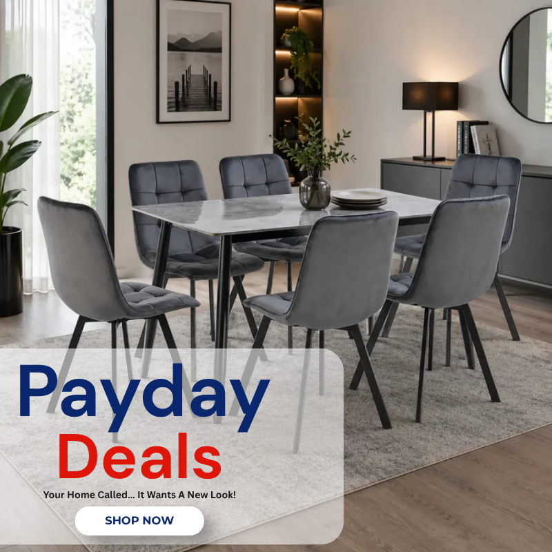 a dining room with a white table and grey chairs