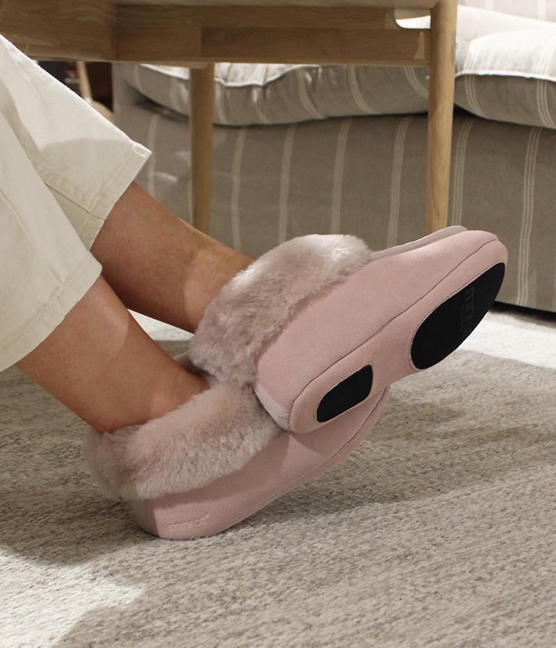 Hemse i rosa med gummidetaljer på sulan för ett bättre grepp