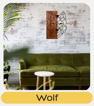 Wolf wire-frame wall art above green velvet sofa in contemporary living room with white brick wall and plant