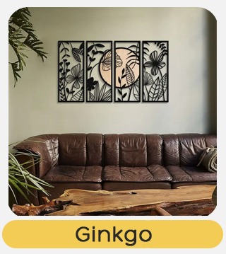 Living room with brown leather sofa, live-edge wooden coffee table and four-panel black ginkgo botanical wall art above