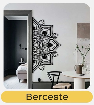 Large black mandala wall decal on a white wall between dining area and bedroom, modern interior with table, chair and vase