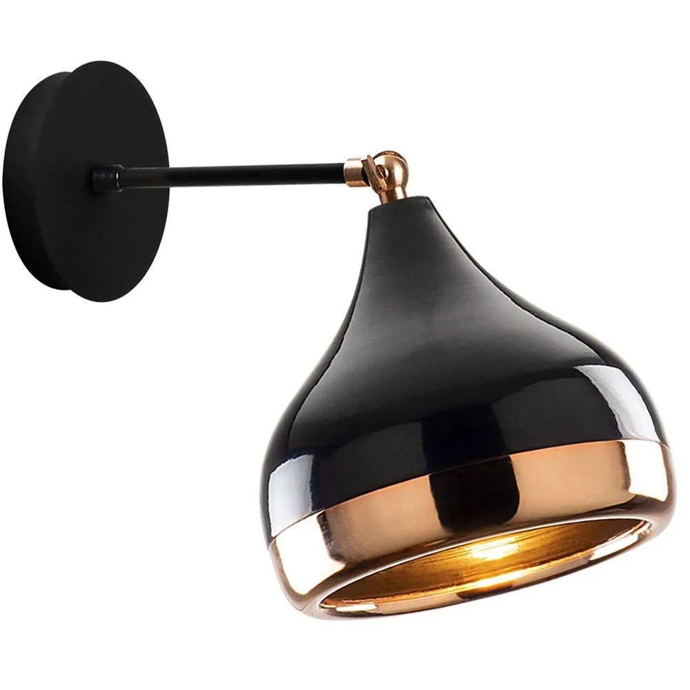 Modern black and copper wall sconce with adjustable arm and warm downward light, contemporary bedside or hallway lamp