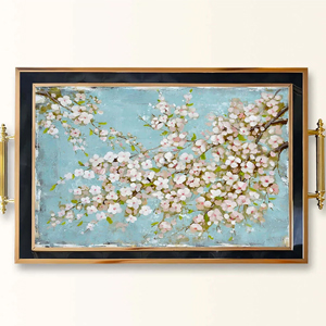 Rectangular decorative serving tray with turquoise cherry blossom painting, gold handles and black-rimmed frame