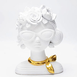 White ceramic decorative female bust with floral crown, oversized sunglasses and gold-painted silk scarf
