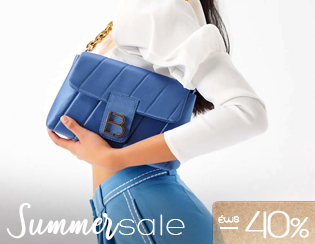 Close-up of woman holding blue quilted leather handbag with gold chain, wearing white blouse and blue trousers; Summer sale -40% banner