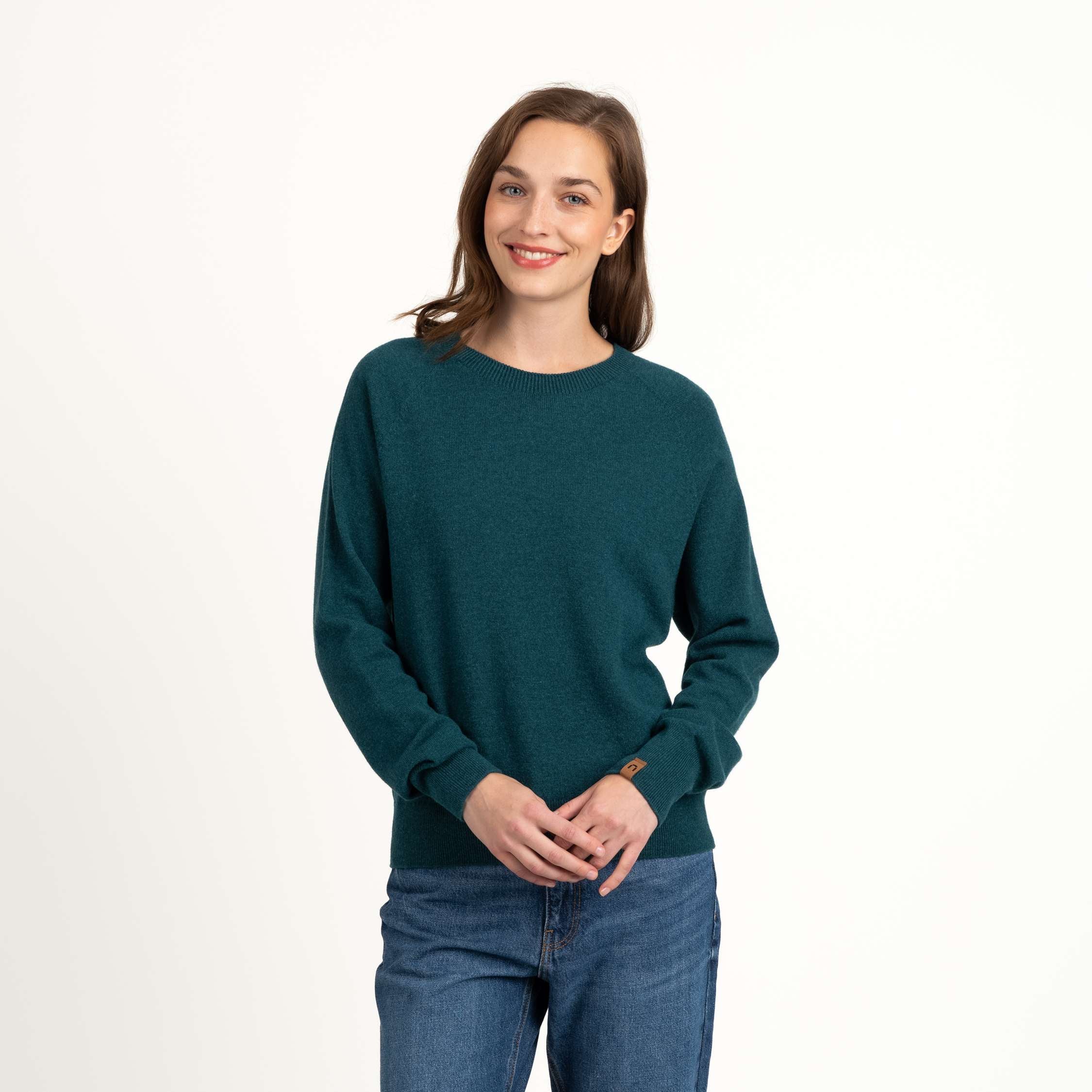 Image of Kide naisten merinoneulepusero - riikinkukon sininen