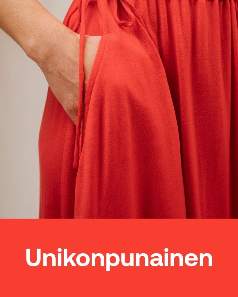 Unikonpunainen Iris mekon lähikuva.